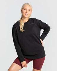 وصف: قميص طويل الأكمام بأكمام طويلة أسود من WOMEN'S BEST Comfort Oversize Long Sleeve T-shirt | أسود.