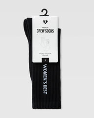 وصف: شرطة جوربين قوية مع كلمات "نساء ويست" منتج Crew Socks (1PK) | أسود من العلامة التجارية SAUDI SHARK.